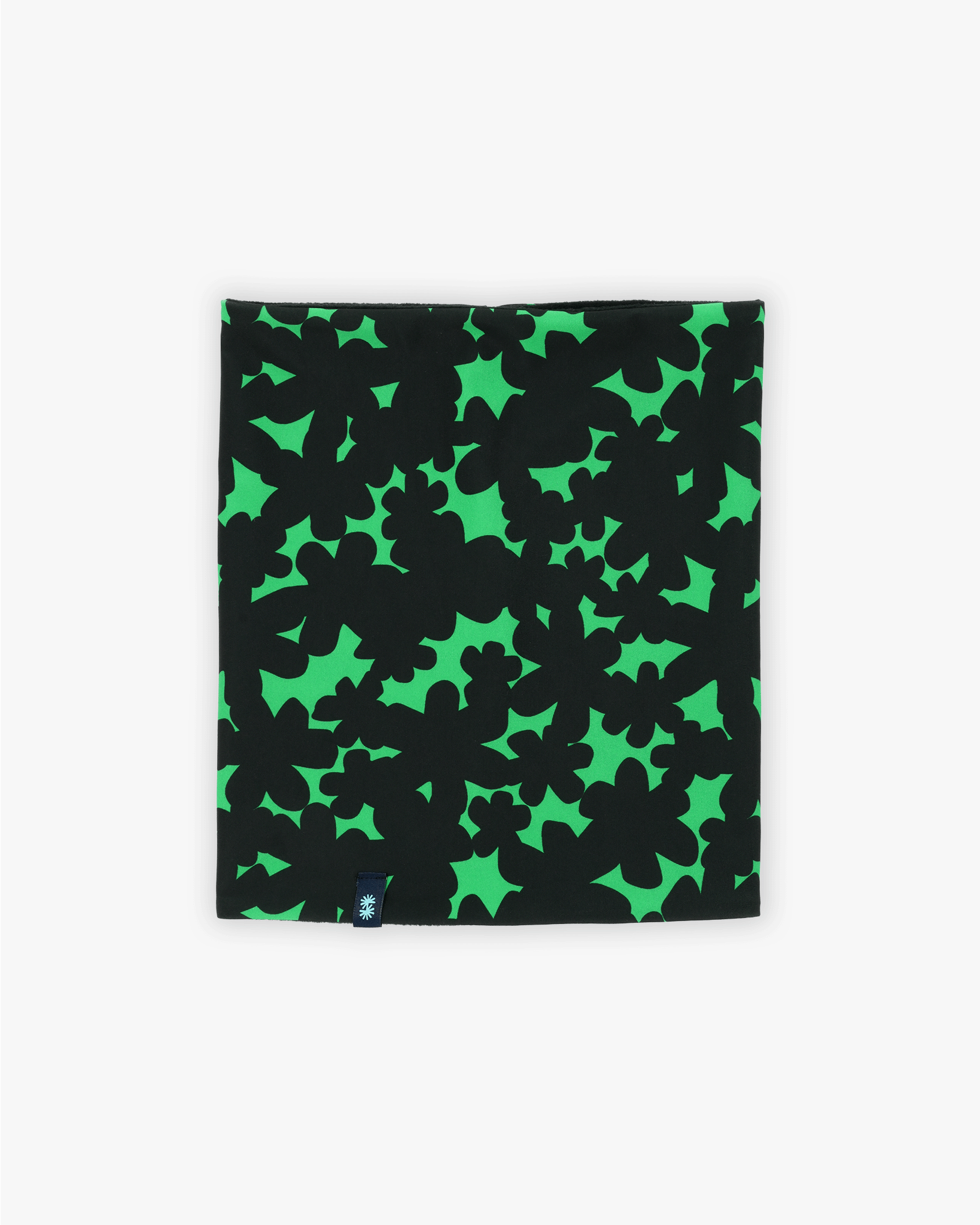 Front view of a double layer neck warmer with black and green floral printed lycra, black fleece lining and black CTW logo woven label
