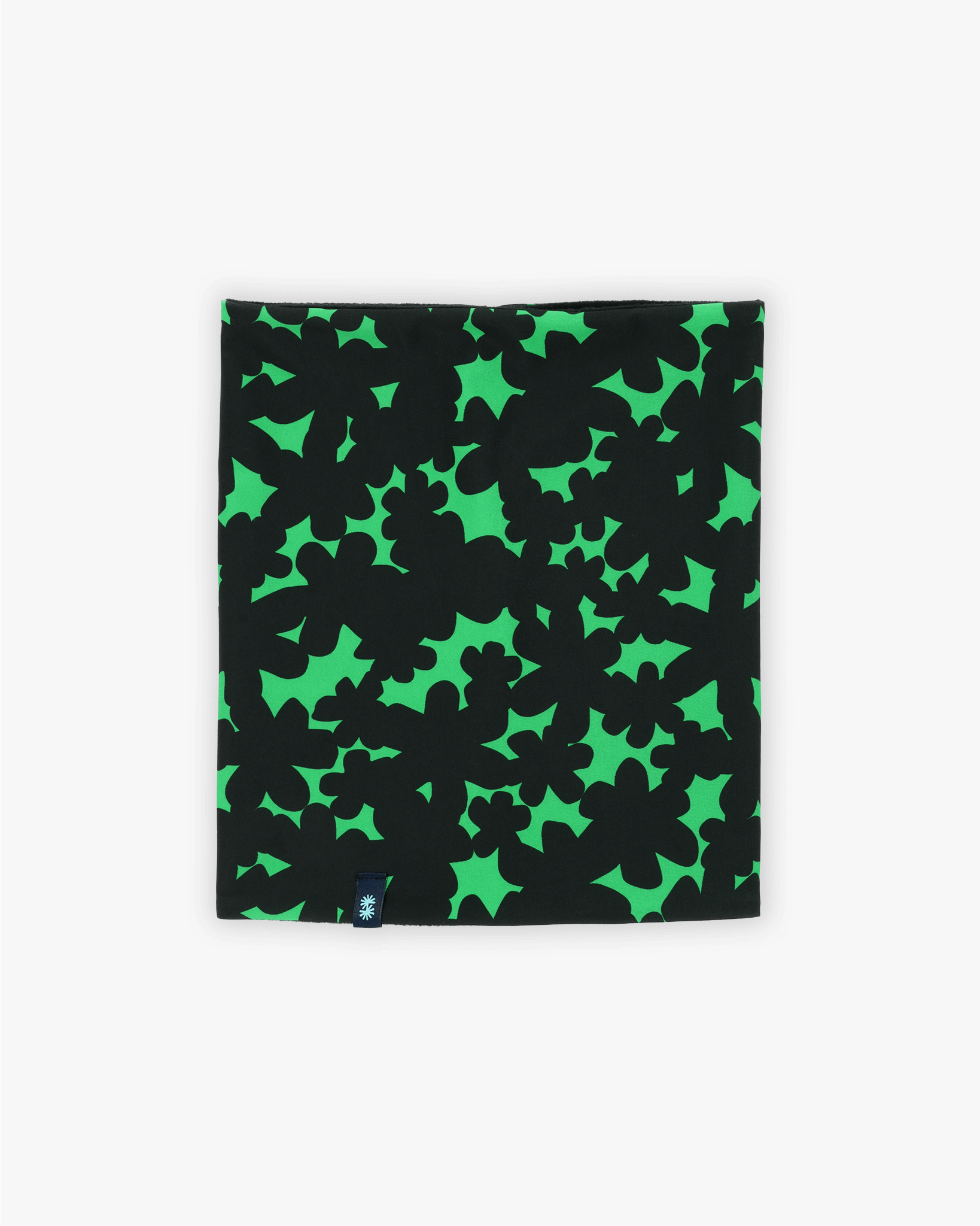 Front view of a double layer neck warmer with black and green floral printed lycra, black fleece lining and black CTW logo woven label