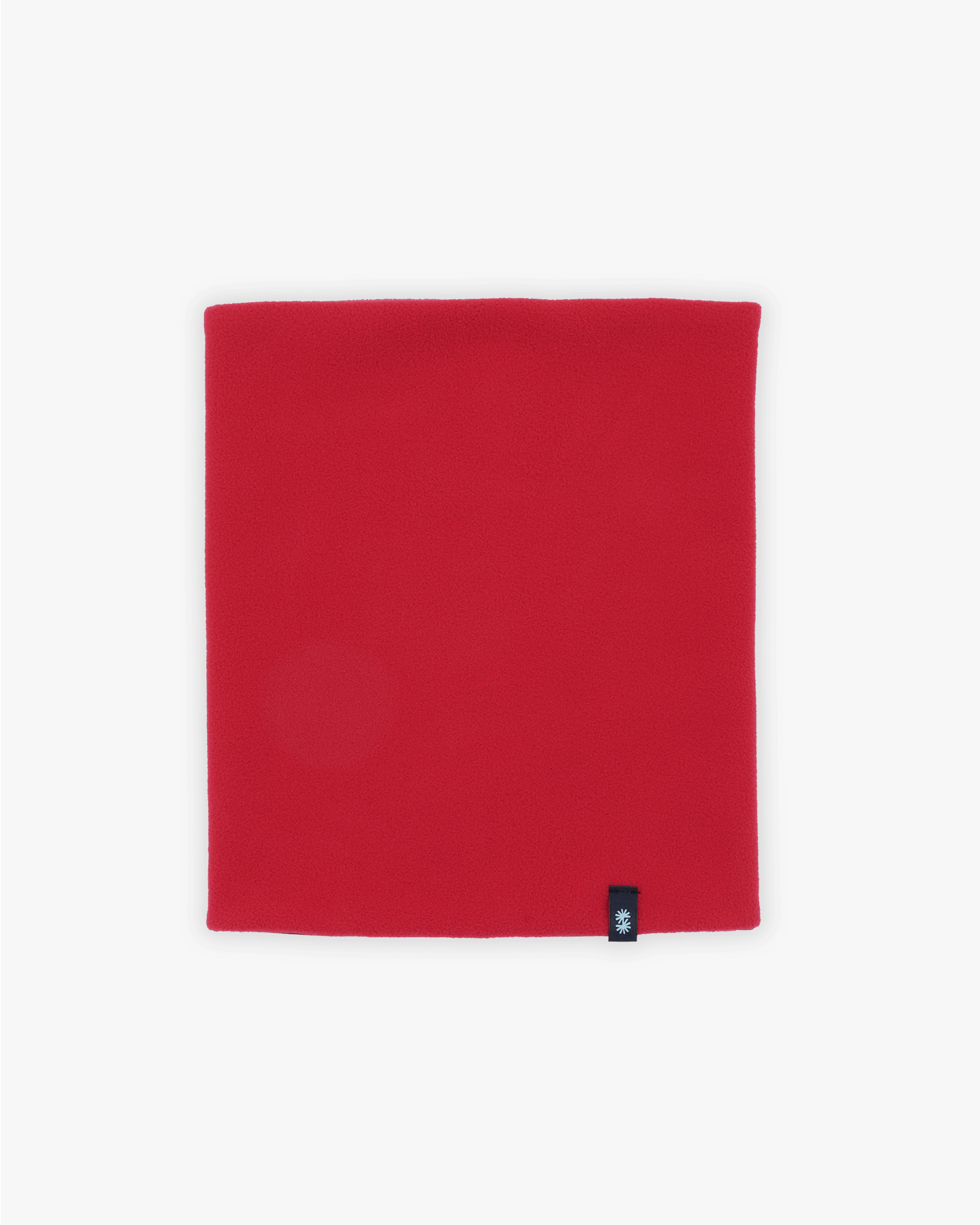 Inside view of a red fleece lining of a double layer neck warmer with red floral printed lycra and woven CTW logo label