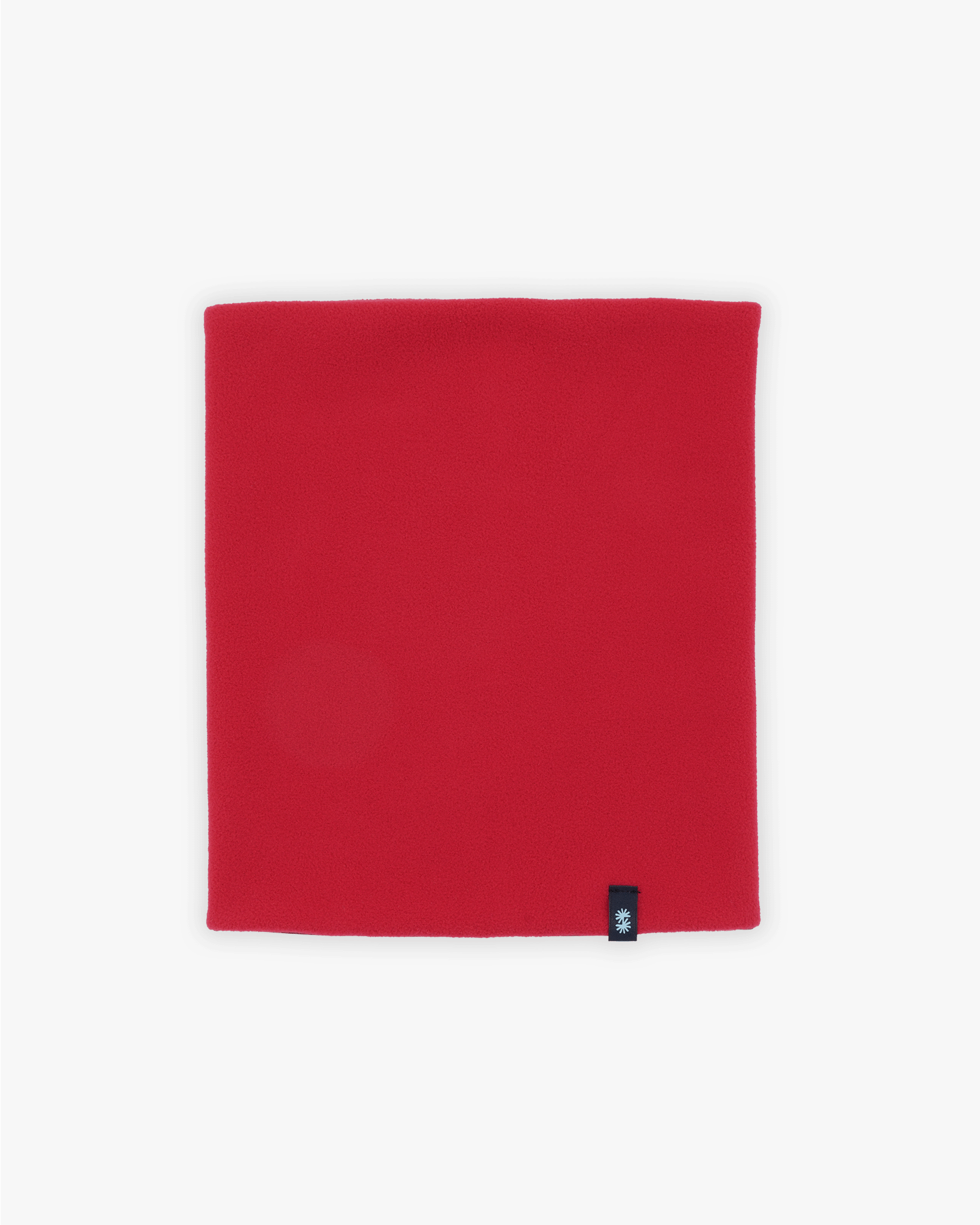 Inside view of a red fleece lining of a double layer neck warmer with red floral printed lycra and woven CTW logo label