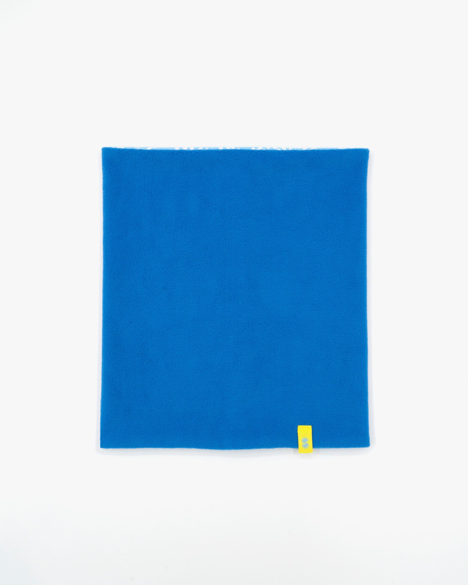 Inside view of a double layer neck warmer with blue fleece lining and yellow CTW logo woven label