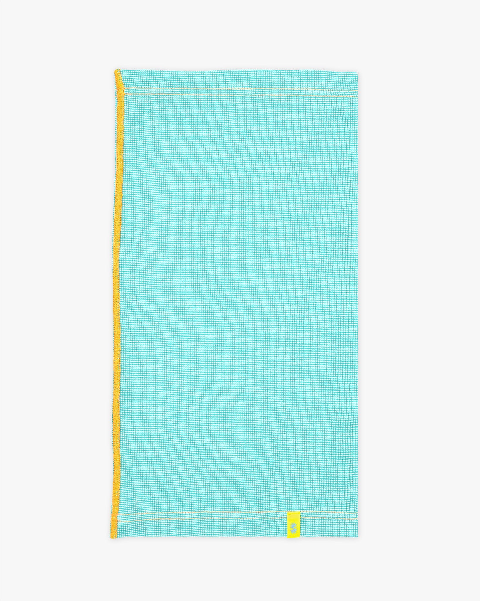 Side view of a long aqua blue Power Wool neck gaiter, with an orange back seam and yellow CTW logo woven label