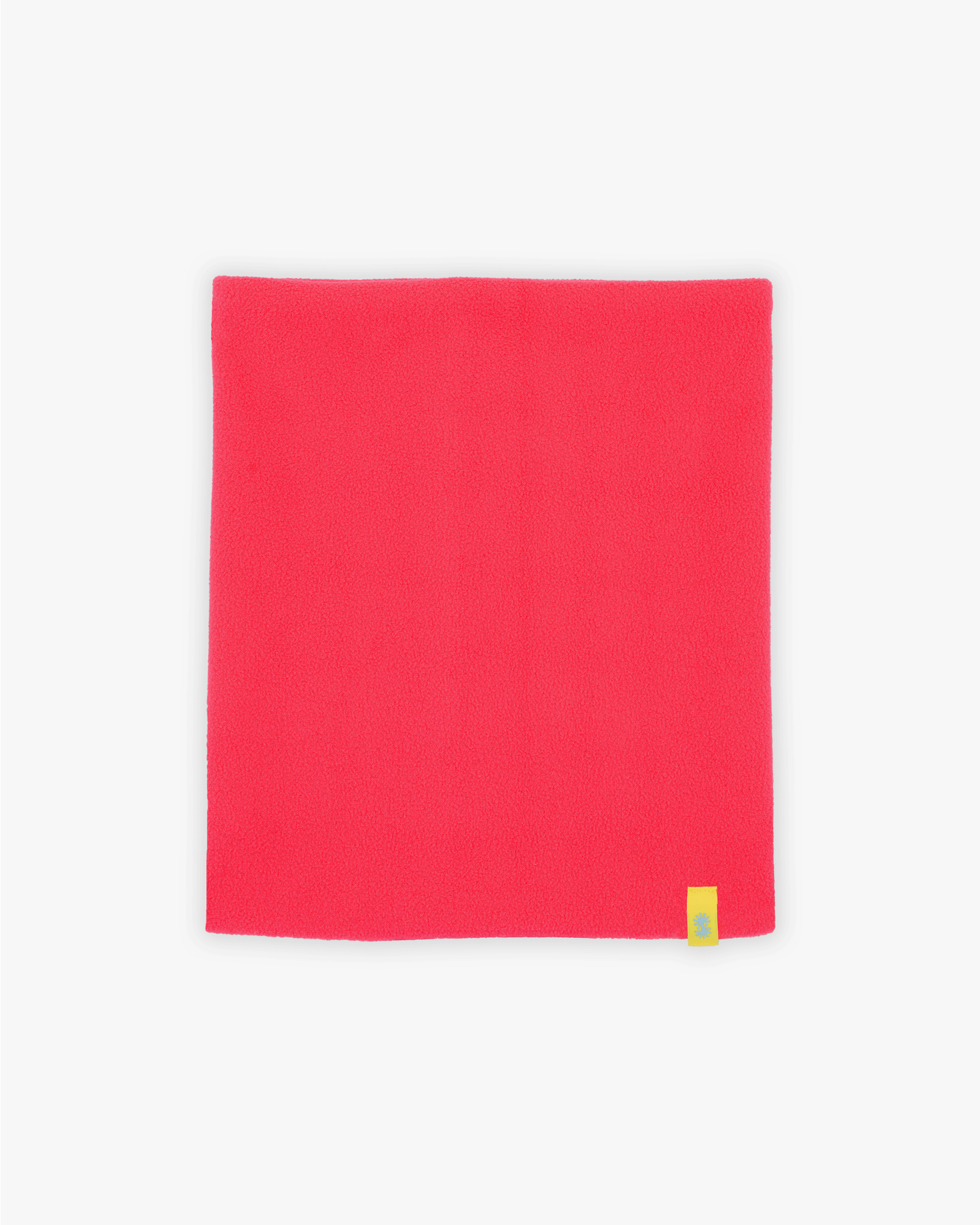 Inside view of a double layer neck warmer with a bright pink fleece lining and yellow CTW logo woven label