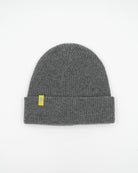 Gray cashmere merino wool beanie with yellow woven label front