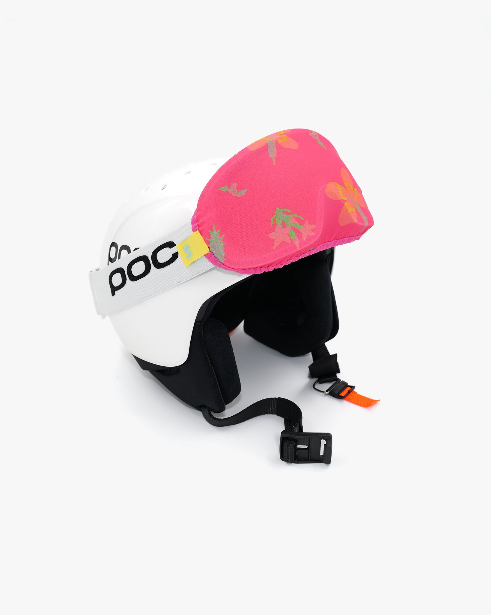 Helmet with goggles covered with a goggle cover with hot pink floral print