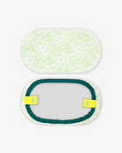 Goggle cover with green and white geometric snowflake print