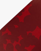 Goggle cover with red floral print close-up