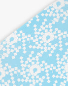 Goggle cover with blue and white geometric snowflake print close-up